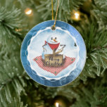 Snowman blizzard picnic personalized Christmas Ceramic Tree Decoration<br><div class="desc">Watercolor style snowman picnic in a blizzard with faux blue foil background on this Christmas tree ornaments for foodies or folks who love snowmen. He wears a napkin,  opening a picnic basket on a red checkered or gingham blanket in a snowy blizzard,  perfect snowman weather!</div>