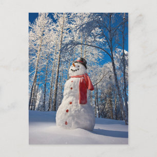 Snowman in Front of Snow-Covered Forest Holiday Postcard