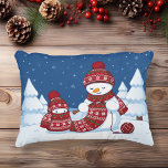 Snowman Knitting Christmas Scarf Decorative Cushion<br><div class="desc">Cartoon illustration of two adorable snowmen dressed in knitted hats and scarves. The big snowman is knitting an oversized scarf for the little one. The scarf is already wrapped several times around the cute little snowman.</div>