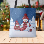 Snowman Knitting Christmas Scarf Tote Bag<br><div class="desc">Cartoon illustration of two adorable snowmen dressed in knitted hats and scarves. The big snowman is knitting an oversized scarf for the little one. The scarf is already wrapped several times around the cute little snowman.</div>