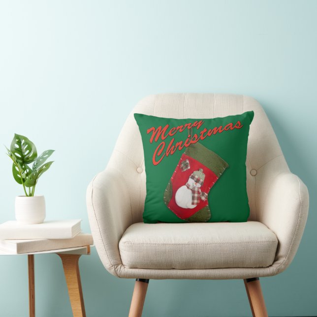 Snowman on Christmas Stocking Over Green Cushion (Chair)