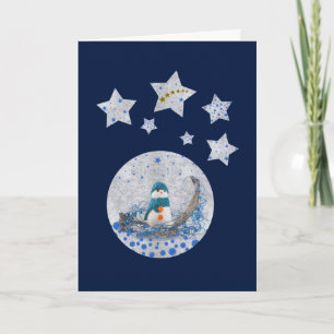 Snowman, sparkly blue stars, gold stars on blue holiday card
