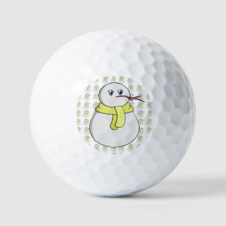 Snowman wearing a yellow scarf golf balls