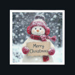 Snowman With a Merry Christmas Sign Napkin<br><div class="desc">A cheerful snowman,  wearing red earmuffs,  cap,  and a matching scarf,  holds a sign that reads "Merry Christmas" amid a snowy background</div>
