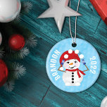 Snowman's Winter Wonderland Christmas Tree Ceramic Tree Decoration<br><div class="desc">Elevate your holiday decor with our enchanting "Snowman's Winter Wonderland" Christmas Tree Ornament. This delightful ornament is a captivating addition to your festive ambiance, boasting a playful design that encapsulates the enchanting spirit of the Christmas season. The front of the ornament features a whimsical snowman juggling snowballs, adding a touch...</div>