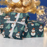 Snowmen Christmas Trees Snowflakes Green Christmas Wrapping Paper<br><div class="desc">Introducing our Super Cute Snowy Wonderland Christmas Wrapping Paper, designed to bring the magic of the holiday season to life. This modern wrapping paper features a delightful green Christmas background, setting the stage for a charming winter scene. Adorning this festive backdrop are adorable snowmen, twinkling Christmas ornaments, intricate snowflakes, and...</div>