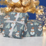 Snowmen Christmas Trees Snowflakes Green Christmas Wrapping Paper<br><div class="desc">Introducing our Super Cute Snowy Wonderland Christmas Wrapping Paper, designed to bring the magic of the holiday season to life. This modern wrapping paper features a delightful green Christmas background, setting the stage for a charming winter scene. Adorning this festive backdrop are adorable snowmen, twinkling Christmas ornaments, intricate snowflakes, and...</div>