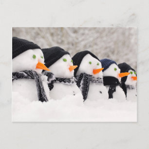 Snowmen Close Up In A Row Postcard