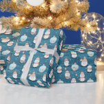 Snowmen Snow Christmas Ornaments Blue Christmas Wrapping Paper<br><div class="desc">Introducing our Modern Christmas Wrapping Paper, a delightful embodiment of winter whimsy and contemporary elegance. This wrapping paper features a serene ice blue background adorned with an endearing pattern of super cute snowmen, playful Christmas ornaments, and delicate snowflakes. The design captures the magic of a winter wonderland, blending the charm...</div>