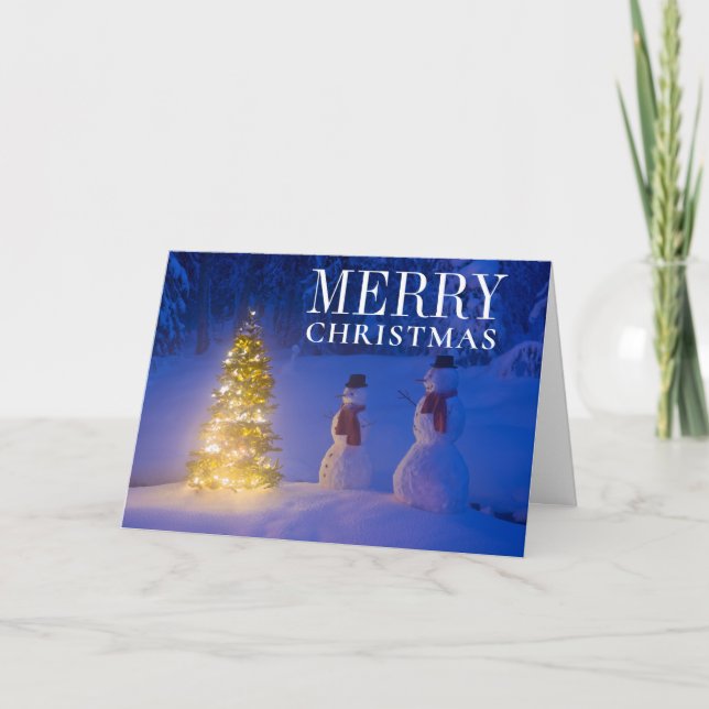 Snowmen Standing Next To Christmas Tree Holiday Card (Front)