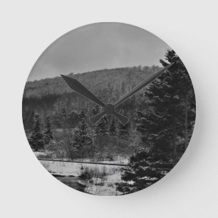 Snowy Landscape in Black and White Round Clock
