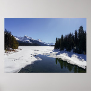 Snowy Maligne Lake Amidst White Peaks Poster