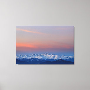 Snowy mountains with magical sky canvas print