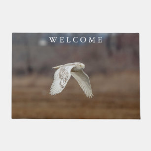 Snowy owl in flight doormat