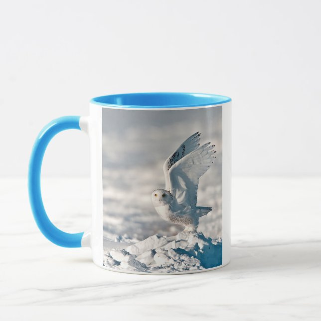 Snowy Owl taking off from snow Mug (Left)
