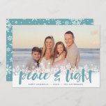 Snowy Peace | Hanukkah Photo Holiday Card<br><div class="desc">Modern Hanukkah photo cards feature your favourite image with a white snowflake border along the bottom. "Peace and light" appears in aqua hand lettered brush typography,  with your names and the year beneath.</div>