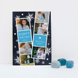 Snowy Photobooth Hanukkah Photo Collage Holiday Card<br><div class="desc">Cute Hanukkah photo card features two photo booth strips, each with three photos and a blue text panel, for a total of six photos. Personalise with the year and your family name or names in whimsical, festive white lettering, on a navy blue background dotted with hand white snowflakes and white...</div>