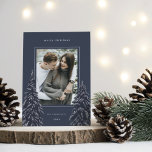 Snowy Pine | Elegant Christmas Photo Holiday Card<br><div class="desc">A modern and elegant Christmas holiday card design featuring a single vertical photo on a navy blue background. Two tall pine trees frame your photo,  dotted with white snow. Personalise with your custom holiday greeting,  family name and the year.</div>