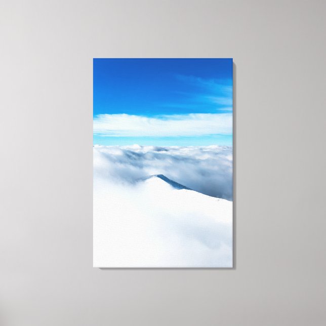 Snowy winter mountain wrapped in clouds canvas print (Front)