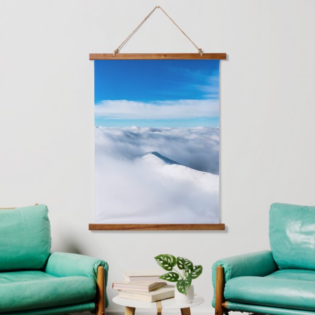 Snowy winter mountain wrapped in clouds hanging tapestry (Living Room)
