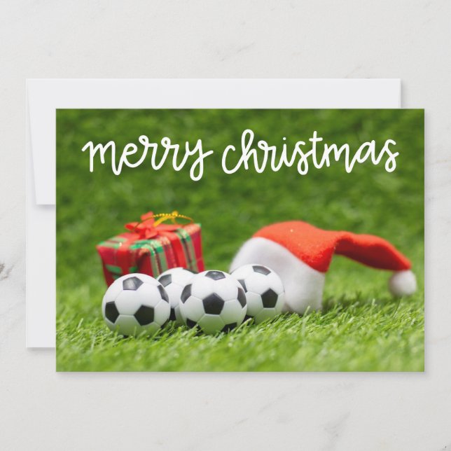 Soccer ball on green grass for Christmas Holiday   (Front)