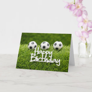 Soccer ball with Happy Birthday sign on green Card