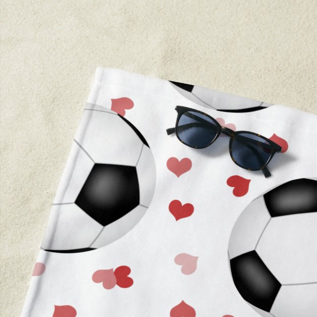 soccer balls and hearts pattern personalised beach towel (In Situ)
