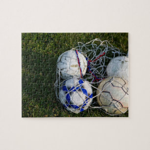 Soccer balls in net jigsaw puzzle