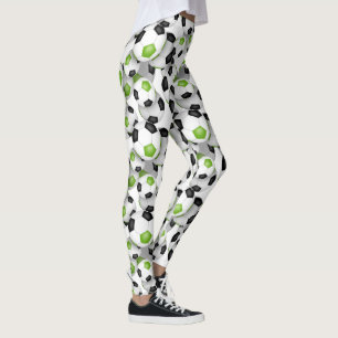 soccer balls with black brt green team colors leggings