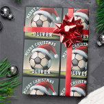 Soccer Football Ball Santa Hat Name Christmas  Wrapping Paper<br><div class="desc">Soccer Football Ball Santa Hat Name Christmas Wrapping Paper. The design has a soccer ball with a red Santa hat. Personalise with your name. You can change the text Merry Christmas.</div>