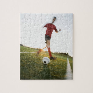 Soccer player dribbling ball jigsaw puzzle