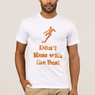 Soccer player kicking ball with saying on t-shirt