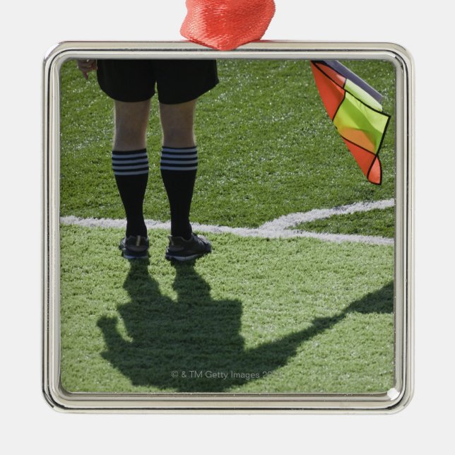 Soccer referee holding flag. metal tree decoration (Front)