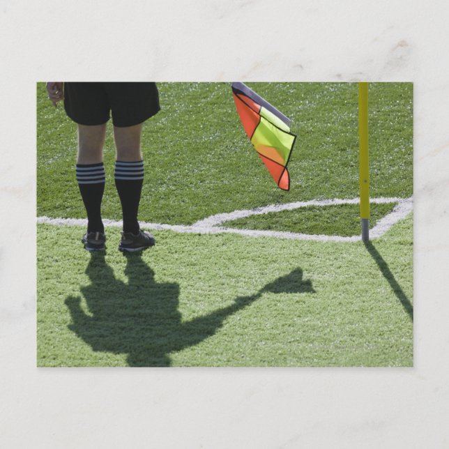 Soccer referee holding flag. postcard (Front)
