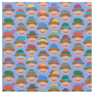 Sock Monkey Heads with caps on Blue Fabric
