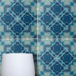 Soft Blue and Indigo Mosaic Geometric Pattern Tile<br><div class="desc">This ceramic tile features a mesmerising kaleidoscopic design. At the heart of the tile is an intricate star-shaped pattern, which serves as the focal point from which symmetrical geometric shapes radiate outward. The design is complex yet harmonious, creating an optical illusion of depth and movement that draws the eye. The...</div>