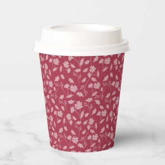 Soft floral pattern on soft red background paper cups