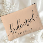 Soft Peach Bridesmaid Modern Calligraphy Accessory Pouch<br><div class="desc">Celebrate your bridal party with this elegant soft peach bridesmaid accessory pouch. Featuring modern calligraphy and customisable with your bridesmaid's name, this pouch is both stylish and practical. The soft dusty sage colour and elegant script create a sophisticated look, perfect for holding makeup, toiletries, or other essentials. This personalised pouch...</div>