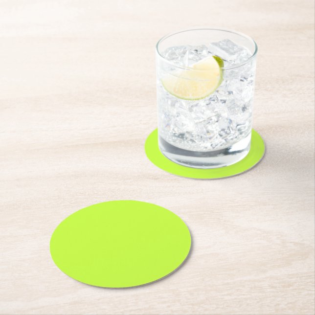 Solid bright lime light green round paper coaster (Insitu)