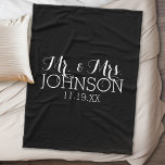 Solid Colour Black Mr & Mrs Wedding Favours Fleece Blanket<br><div class="desc">A bold colour with chic fonts make a statement piece for a reception favour. Items are easier to customise when you replace all text and photos first. If your art still needs to be adjusted, click on the Customise This button. This will take you to a design area where you...</div>
