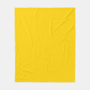 Solid colour bright yellow fleece blanket