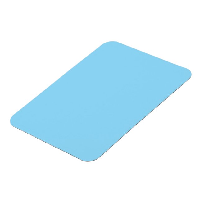 Solid light blue background evenly coloured magnet (Left Side)