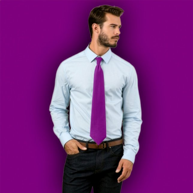 Solid  Purple Tie -  Single Colour Necktie (Man wearing a solid purple necktie, standing against a purple background that matches the tie.
)