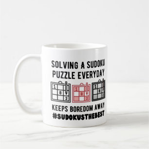 Solving a sudoku puzzle  everyday   coffee mug