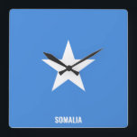 Somalia Flag Dazzling Patriotic Square Wall Clock<br><div class="desc">Somalia Flag Dazzling Patriotic Square Wall Clock in the colours and the elements of the Somalia national flag covering the front of the clock. National flag colours are complemented with the text "Somalia" on the bottom. Text is fully customisable using "Customise it!" feature. Feel free to change it, remove it...</div>