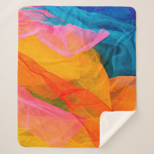 Some multicolored fabric. background,colour,craft, sherpa blanket