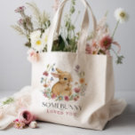 Somebunny Baby Shower Wildflower Grocery Tote Bag<br><div class="desc">Somebunny loves you tote bag!  This design features a delicate wreath bouquet of hand painted wildflowers surrounding an adorable baby bunny. A lovely combination of modern and rustic fonts complete this sweet design. See the entire collection for more matching items!</div>