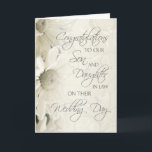 Son & Daughter In Law Wedding Congratulations Card<br><div class="desc">Congratulations to our son and daughter in law on their wedding day card. Elegant and stylish with white floral design,  the perfect way to tell them how very proud you are on this special day.</div>
