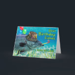 Son in Law Birthday Fish Ready to Party Card<br><div class="desc">You're one in a GILL-ion! Birthday greeting card for Son in Law features the front of a fish holding balloons with its fin and blowing a party noise maker. It is also wearing a camouflage fishing hat with fishing lures attached. Art, image, and verse copyright © Shoaff Ballanger Studios, 2024....</div>