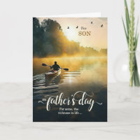 Son on Father's Day Rowing Kayak on the Lake